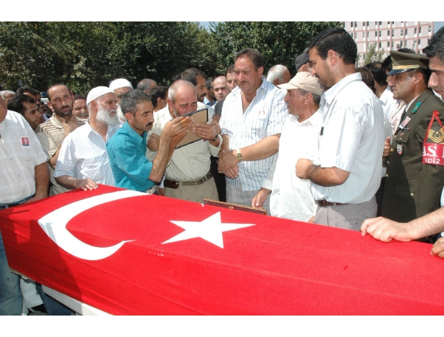 14 yıl sonra şehit sayılan askerin naaşı şehitliğe taşındı