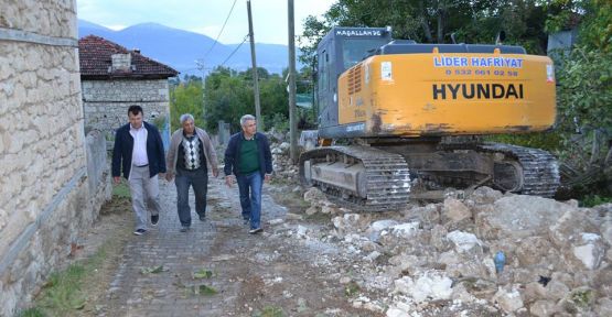 KUZÖREN MAHALLESİNDE YOL GENİŞLETME ÇALIŞMALARI BAŞLADI 